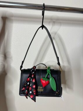 Steve Madden Black Crossbody Bag with Red Strawberry Charm and Green Leaf